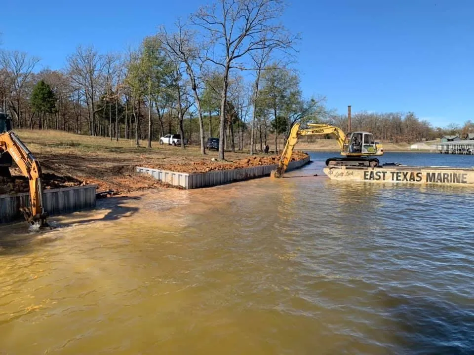 Pictured construction of a deck in progress with heavy equipment